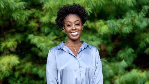 Student smiling at camera