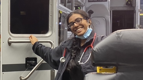 student smiling in EMT