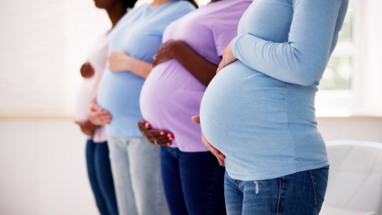 Four pregnant people.