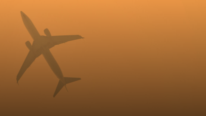 Image of plane in pollution.