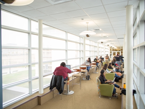 Students in hall studying.