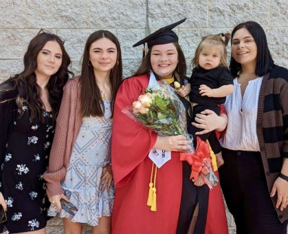 Student Smiling with family