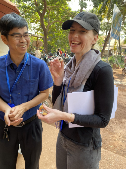 Downs and colleague Nida Chhinh collecting data in rural Cambodia.