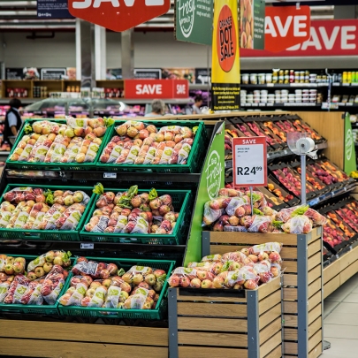 Apples on display at grocery store.