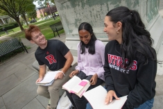 Students sitting together outside