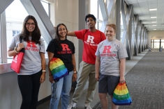 Students standing together with SPH swag