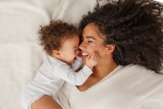 Mother and baby cuddling