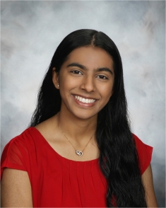 student smiling at camera